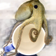 An octopus investigating a coffee cup.